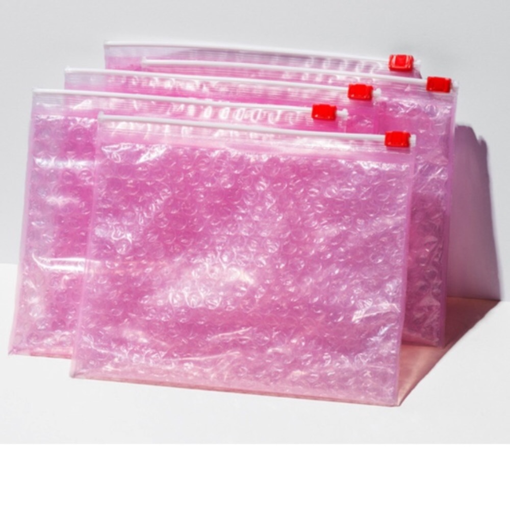 Glossier Pouches